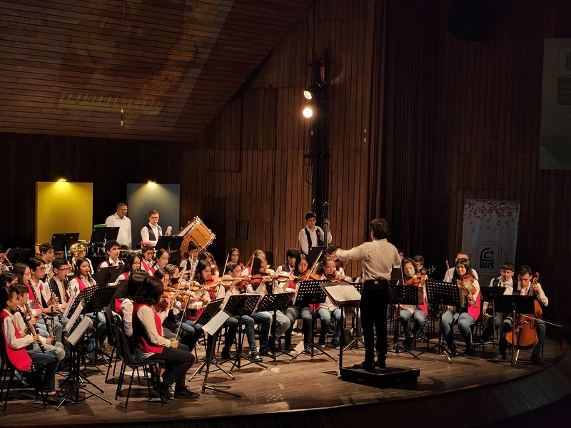 La imagen muestra la Banda Sinfónica Fundación Colegio UIS