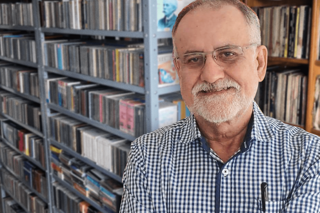 engineer José Iván Hurtado in his personal music library