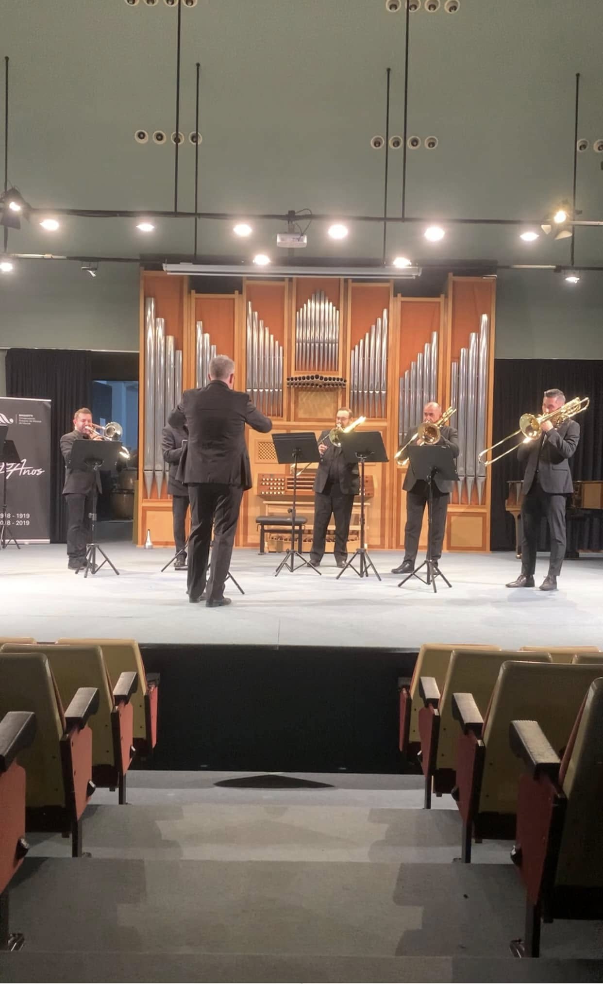 Profesor Robinson Giraldo Villegas junto a otros maestros en encuentro de Trombonistas