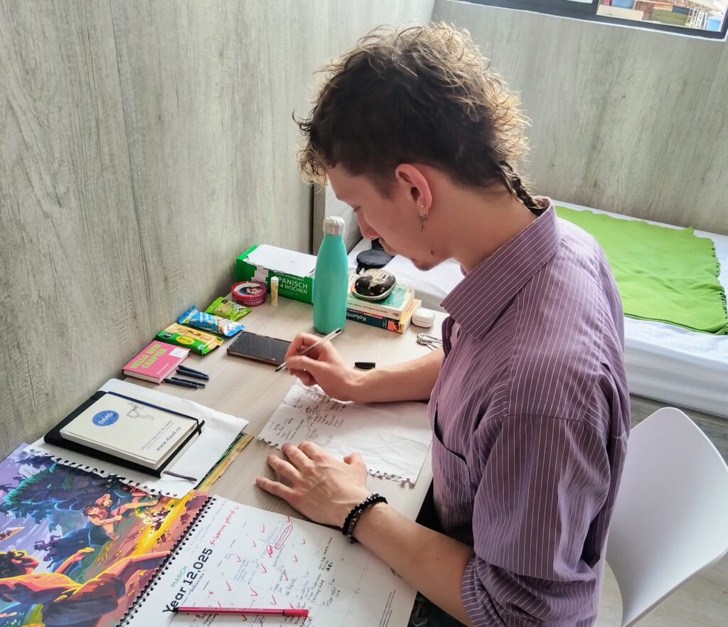 German student and volunteer, Levin Seidinger, deepening his studies in his room at the UIS 2 residences.